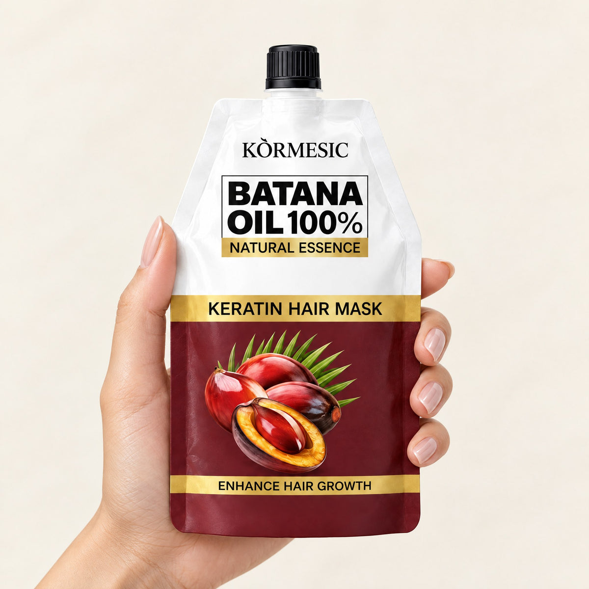 KÒRMESIC Batana & Keratin Repair Hair Mask, shown in hand