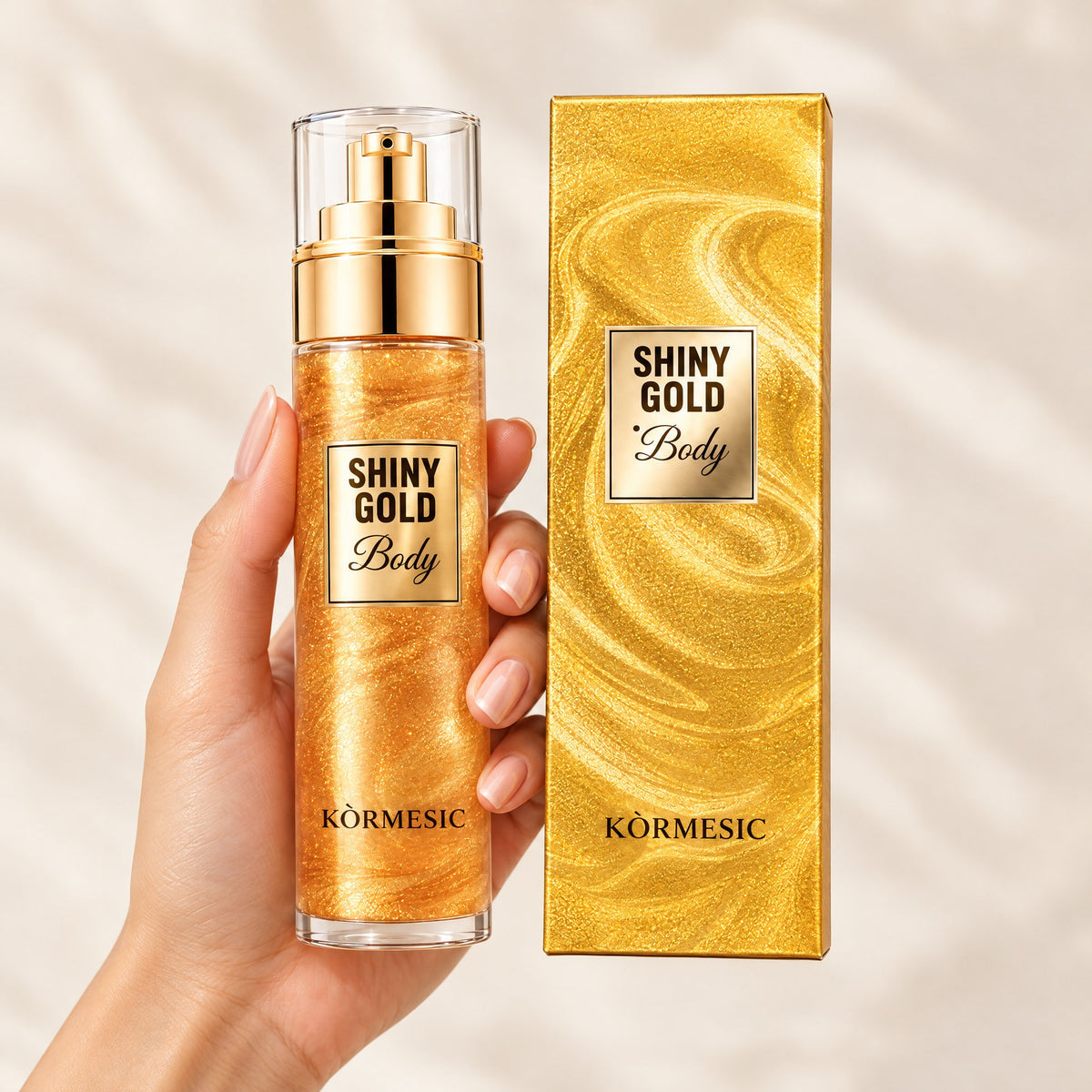 KÒRMESIC Sparkling Gold Body Highlighting Oil, shown in hand